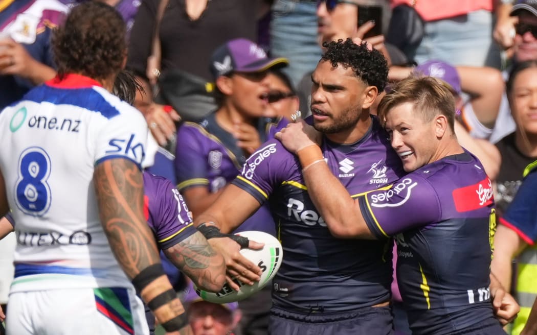 Xavier Coates of the Storm is congratulated by Harry Grant after scoring a try during the Telstra NRL Premiership match between the NZ Warriors and the Melbourne Storm.