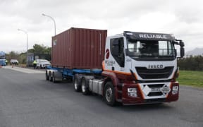 Police teams stop trucks going south from Whangārei to make sure they're not over the weight limits.