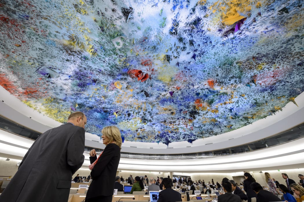 Delegates speaks prior to the opening of a session of the Human Rights Council on the Palestinian territories situation on March 23, 2015 in Geneva.