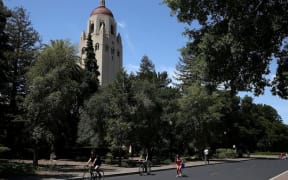 The victim was seen lying unconscious on the ground on the Stanford campus.