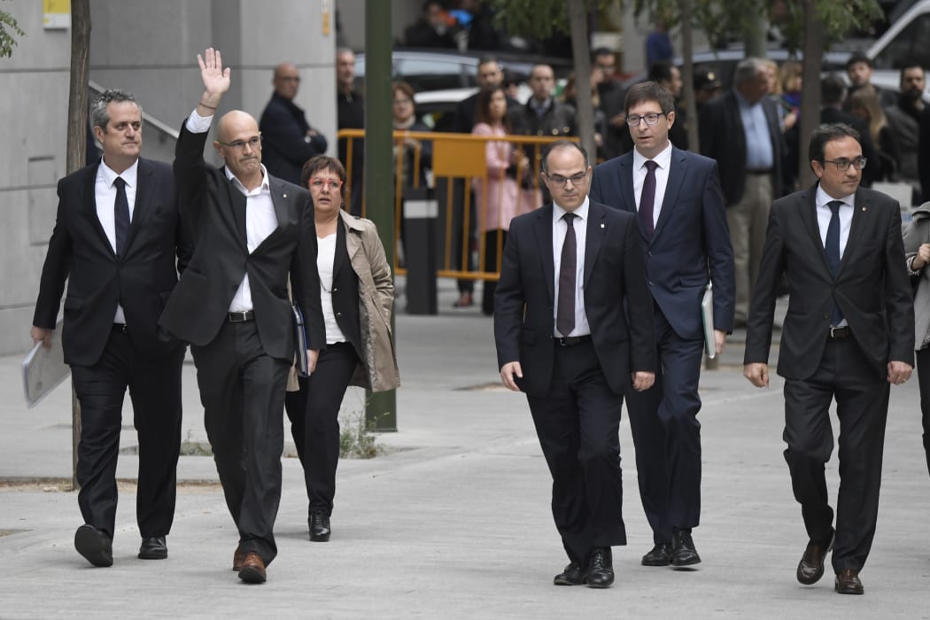 Former ministers in the deposed Catalan  government arrive at court.