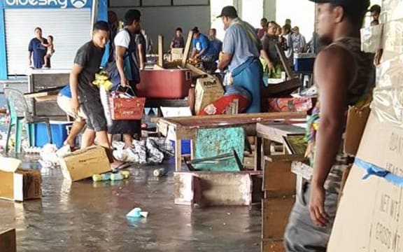 A scene from the damaged market at Salelologa