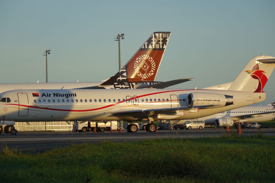 Air Niugini and Fiji Airways parked at Nadi International Airport in Fiji
