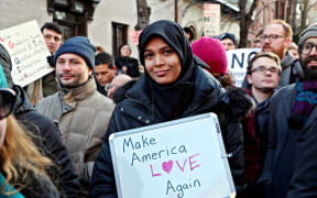 The protest, sponsored by more than a dozen advocacy groups and local politicians, was held outside the historic Stonewall Inn in Manhattan's West Village neighborhood, the symbolic heart of the LGBTQ rights movement.