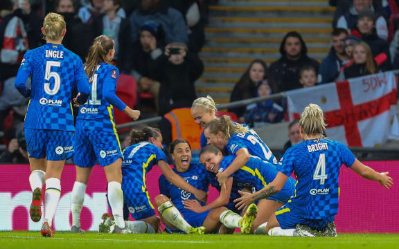 Sam Kerr celebrates with her Chelsea teammates