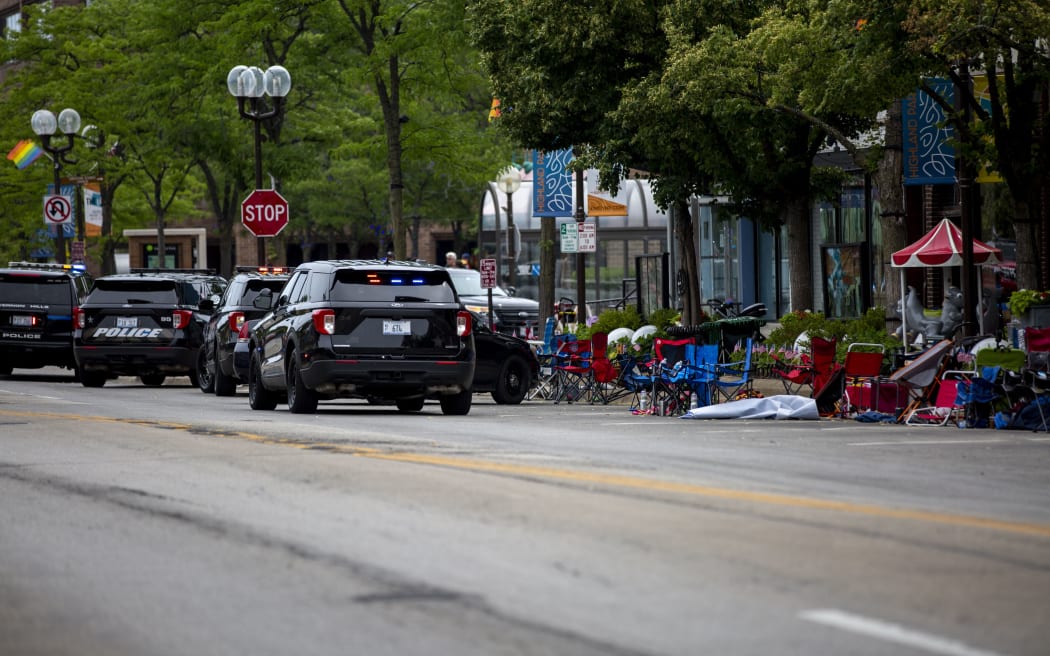 First responders work the scene of a shooting at a Fourth of July parade in Highland Park, Illinois, July 2022.