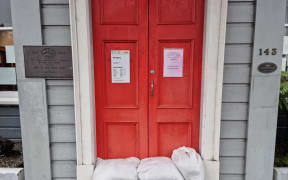 Buildings in Westport are sandbagged as more heavy rain is forecast on 4 February 2022.