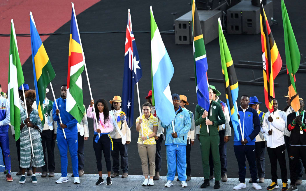 Flag bearers at the Birmingham Commonwealth Games closing ceremony.