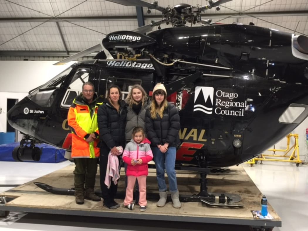 Chris Coory of Landsar with the group rescued from Silver Peaks.