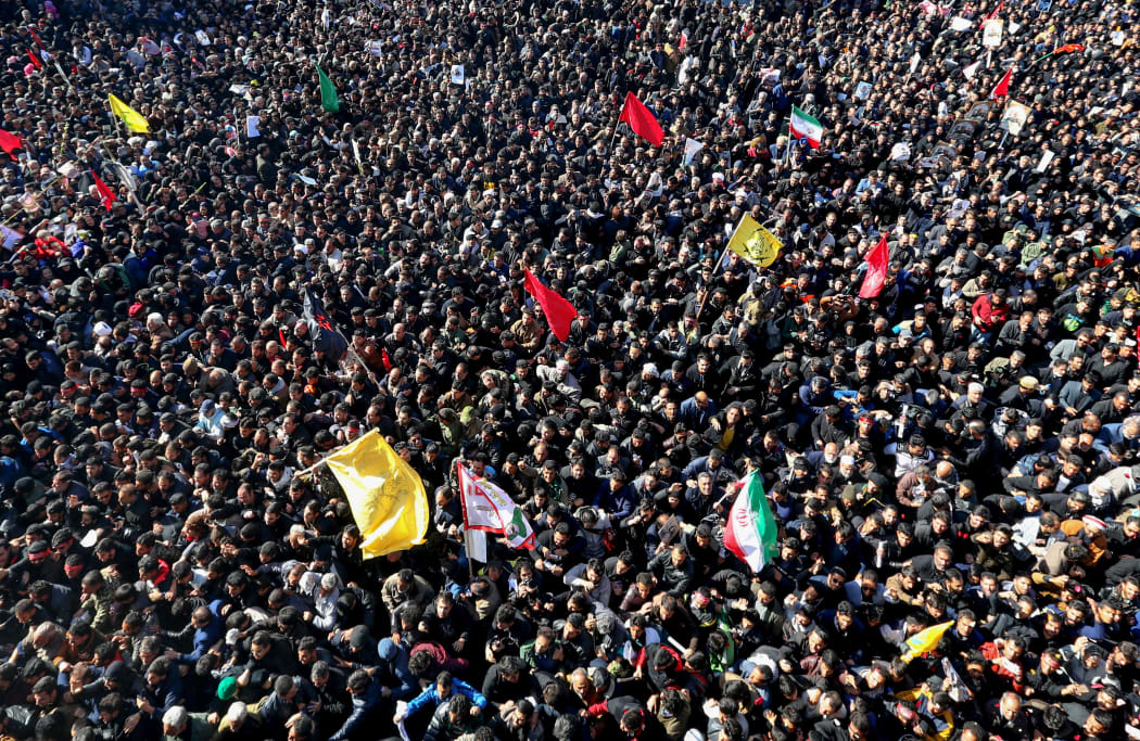 Iranian mourners gather during the final stage of funeral processions Qasem Soleimani, in his hometown Kerman.