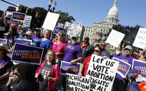 Pro choice supporters gather outside the Michigan State Capitol during a "Restore Roe" rally in Lansing, on 7 September, 2022.