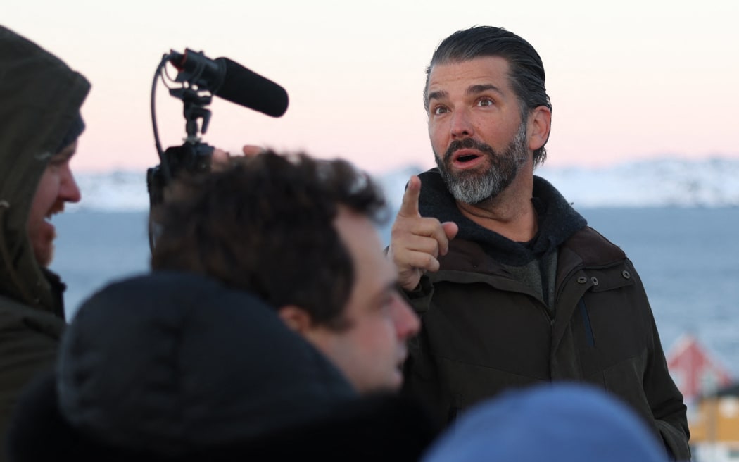 US businessman Donald Trump Jr. looks on after arriving in Nuuk, Greenland on January 7, 2025. - Donald Trump Jr made a private visit to Greenland, a Danish autonomous territory coveted by Trump Sr and which hopes to one day be independent but remains dependent on Copenhagen for now. (Photo by Emil Stach / Ritzau Scanpix / AFP) / Denmark OUT / DENMARK OUT