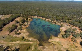 Drone aerial view looking down over sapphire mine diggings in central Queensland Australia.