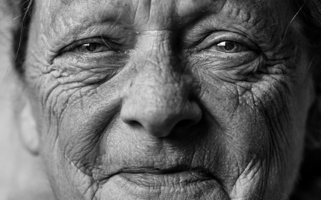 close up of an elderly person's face