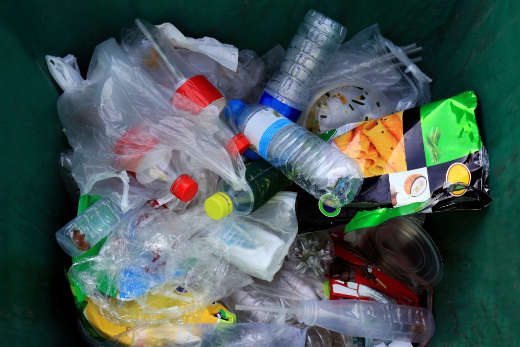 Garbage trash pile of waste plastic bag and bottle.