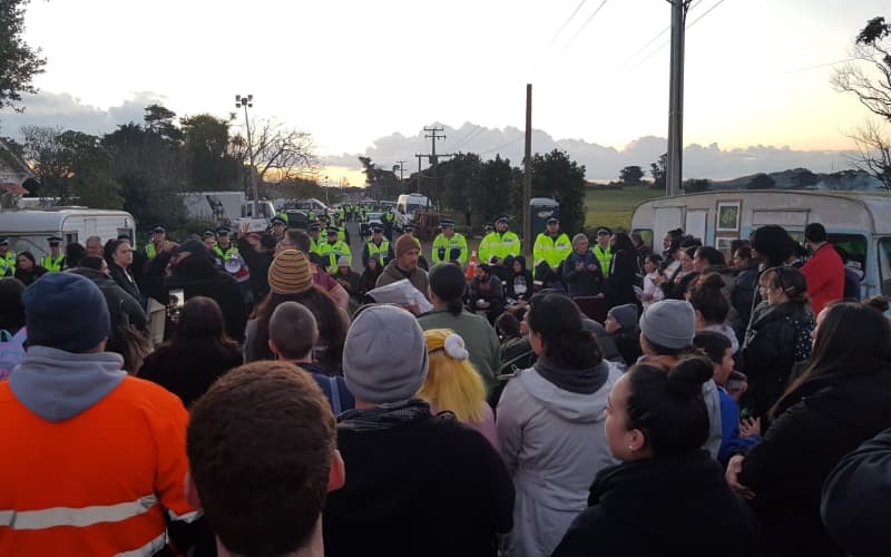 Protesters and police at Ihumatao.