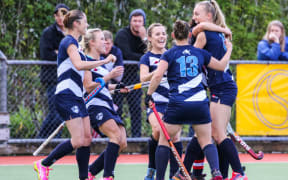 Auckland celebrate Liz Thompson's goal.