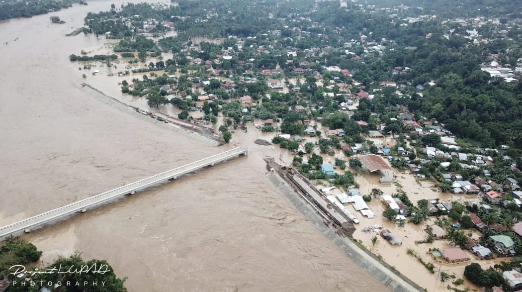 An aerial image taken by a drone of the city of Cagayan de Oro on the Philippines' island of Mindanao on Friday, after the area was struck by Tropical Storm Tembin.