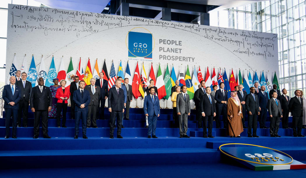 (From L) US President Joe Biden, DR Congo President Felix Tshisekedi,  Minister, Mario Draghi and other world leaders pose at G20 on October 30, 2021