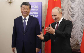Russia's President Vladimir Putin meets with Chinese President Xi Jinping on the sidelines of the BRICS summit in Kazan on October 22, 2024. (Photo by Alexander Zemlianichenko / POOL / AFP)