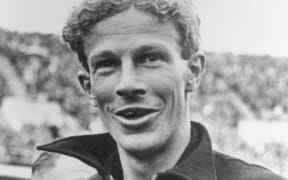 John Lovelock relaxes in the Olympic Stadium during the 1936 Olympic Games in Berlin.