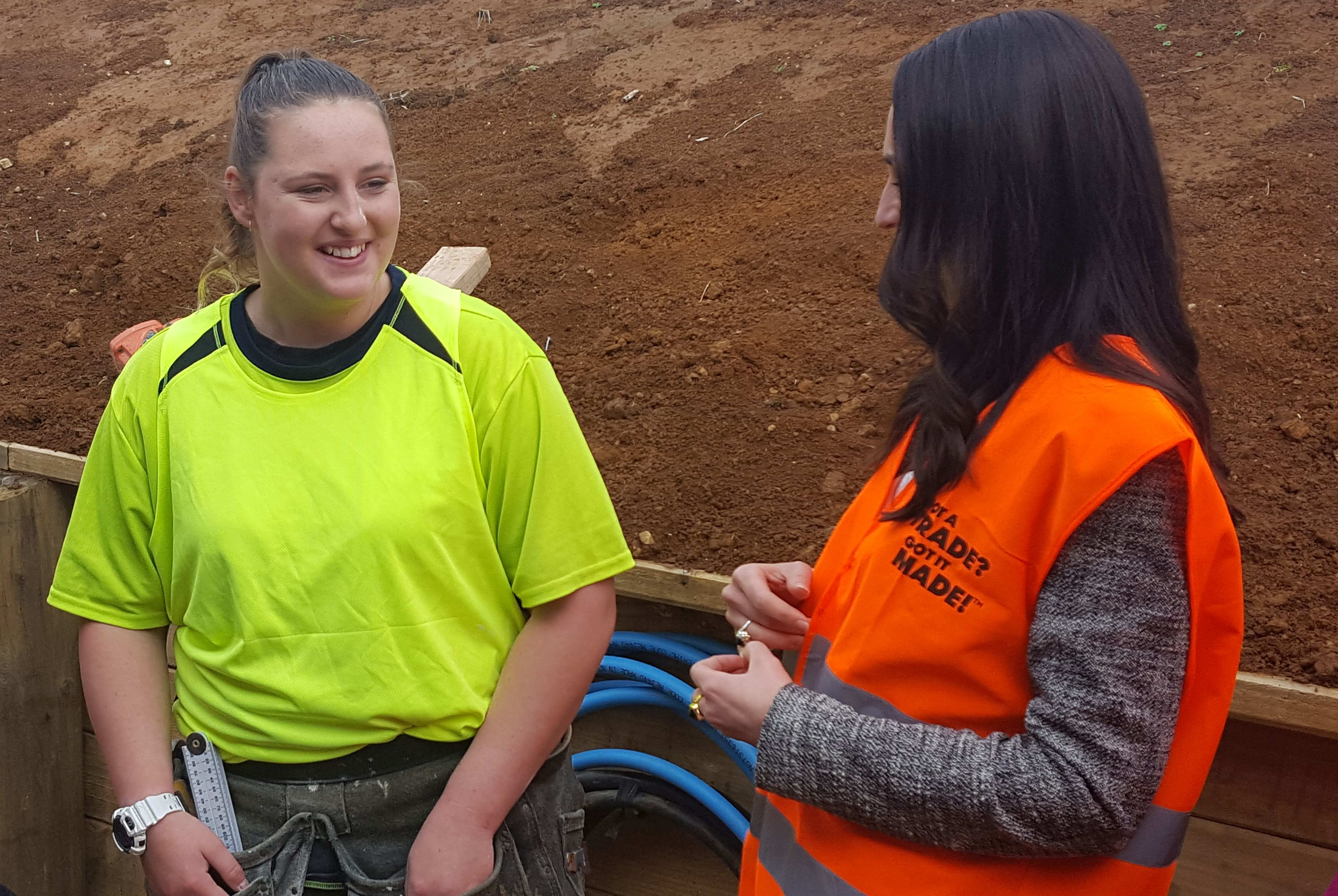 Labour Party leader Jacinda Ardern, right speaking to the sole female apprentice on a Pukekohe building site, 18-year-old Megan Youth-Cathcart, .