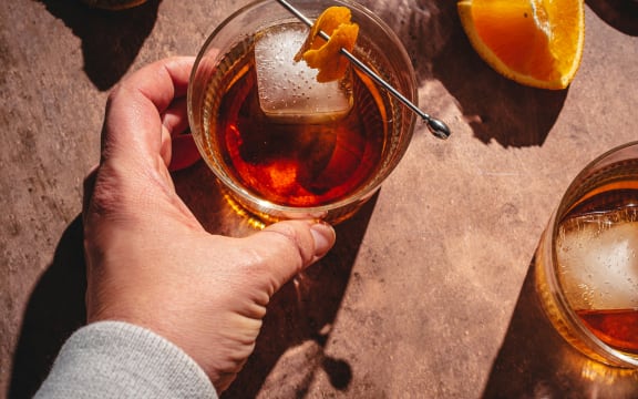 Person having a drink.