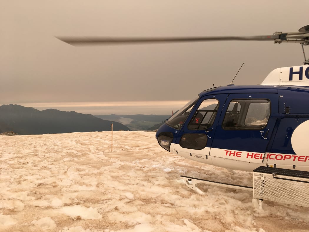 Chancellor Shelf, 1800m above the Fox Glacier, where an orange haze and patches of ash have fallen from the smoke drifting off Australia's bushfires. (Picture taken on 1 January, 2020)