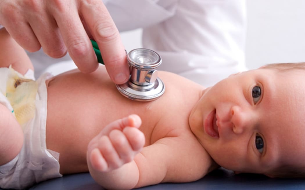 Stethoscope on baby's chest