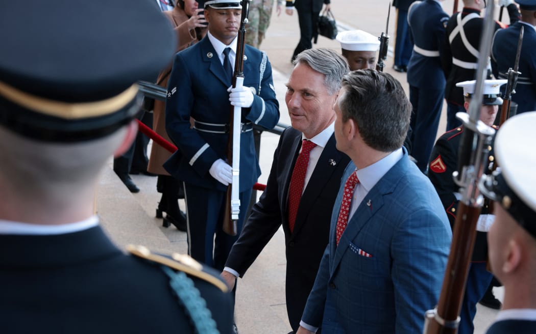 ARLINGTON, VIRGINIA - FEBRUARY 07: U.S. Secretary of Defense Pete Hegseth (R) welcomes Australian Deputy Prime Minister and Defense Minister Richard Marles (L) during an honor cordon at the Pentagon on February 7, 2025 in Arlington, Virginia. Marles is on a visit in Washington to meet with Secretary Hegseth, other Trump administration officials, and U.S. Congressional members.   Alex Wong/Getty Images/AFP (Photo by ALEX WONG / GETTY IMAGES NORTH AMERICA / Getty Images via AFP)
