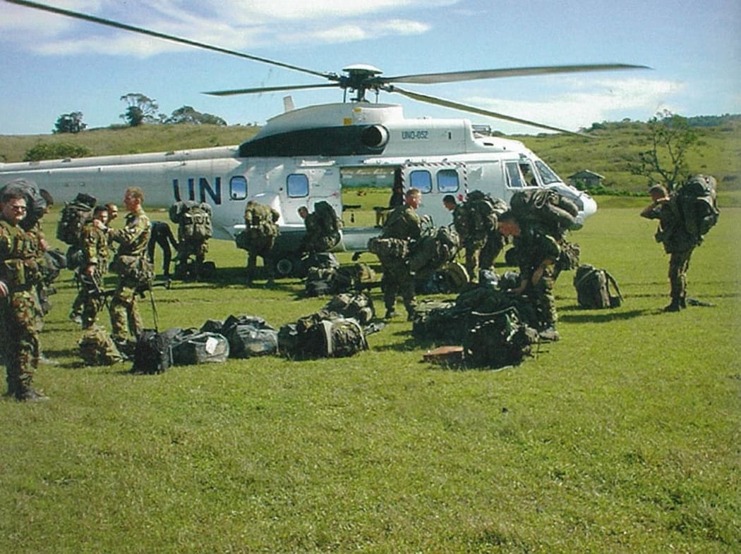New Zealand troops preparing to board a United Nations Puma helicopter at Belulik Leten. The New Zealand company base at Belulik Leten was about a 12-minute helicopter flight from the battalion headquarters in Suai, but a three-and-a-half hour journey by road in good conditions.