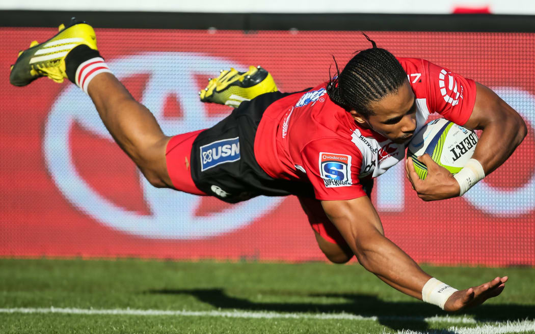 The Lions' Courtnal Skosan scores against the Chiefs.