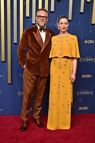 Canadian actor Seth Rogen (L) and his wife Lauren Miller arrive for the 77th Primetime Emmy Awards at the Peacock Theatre at LA Live in Los Angeles on September 14, 2025. (Photo by Frederic J. Brown / AFP) / RESTRICTED TO EDITORIAL USE