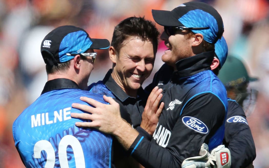 Trent Boult celebrates his wicket of Mitchell Starc.