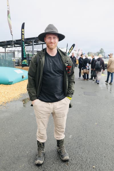 Cody Fitchers, from Bombay between Auckland and Waikato, wearing laced-up boots, jacket and hat at Fieldays on 12 June, 2025.