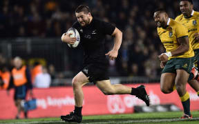 Dane Coles of the All Blacks runs in a try during the Bledisloe Cup Rugby test match between New Zealand and Australia at Eden Park
