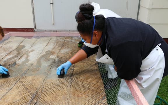 Reporter Jamie Tahana visits Rangatira Marae, in the flood-ravaged community of Te Karaka, where whanau are trying to preserve what taonga they could salvage. Pictured: Rangituatahi Te Kanawa (Ngāti Maniapoto)
