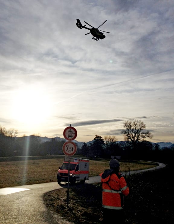 A rescue helicopter flies to the site of a train accident on February 9, 2016 near Bad Aibling, southern Germany.