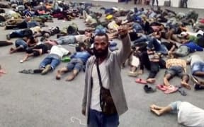 A group of people who were arrested in Surabaya.