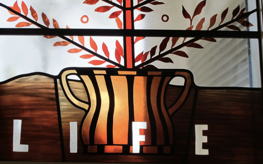 Stained glass window with word LIFE