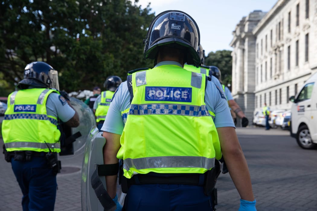 Protestors and Police standoff as police move concrete barricades