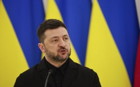 Ukraine's President Volodymyr Zelensky speaks during a joint press conference with Lithuania's President and Poland's President, after attending commemorations of the 1863 uprising, in Vilnius on January 25, 2026. (Photo by Petras Malukas / AFP)
