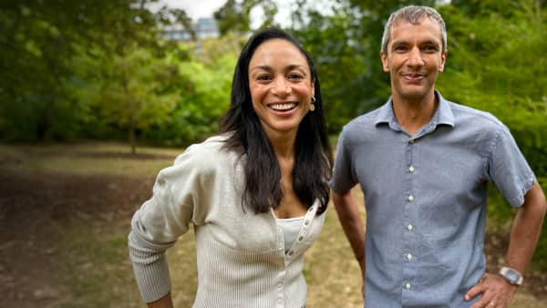 Broadcaster Sonia Gray stands smiling with University of Auckland neuropsychopharmacologist Suresh Muthukumaraswamy.