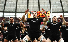 The All Blacks perform the haka ahead of the test match with Japan at Tokyo Stadium.