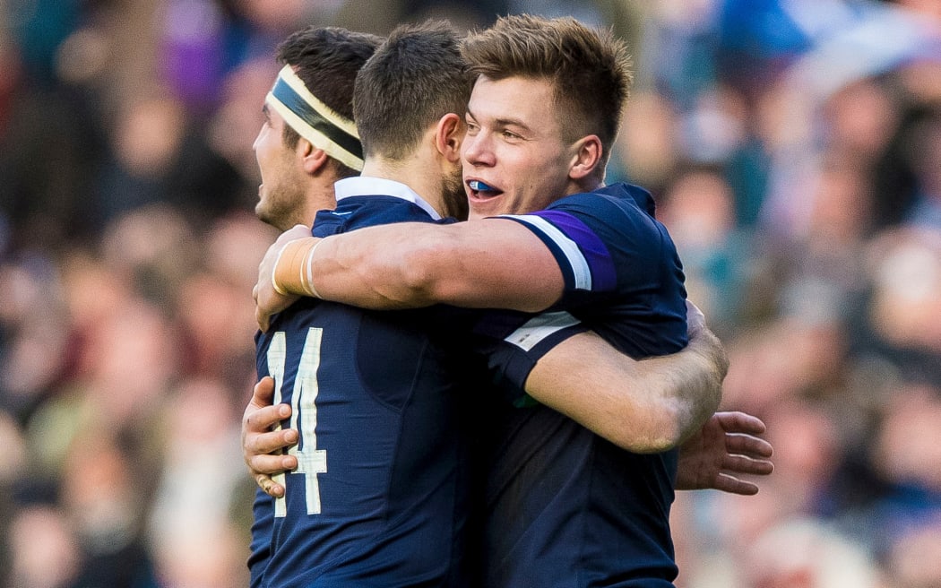 Scotland players celebrate a Tommy Seymour try.