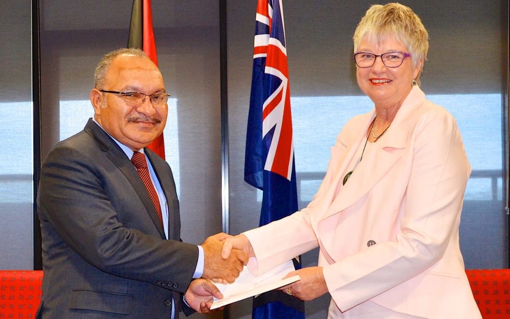 Papua New Guinea prime minister Peter O'Neill accepts the credentials of New Zealand's new high commissioner to PNG, Sue Mackwell, 4 May 2017.