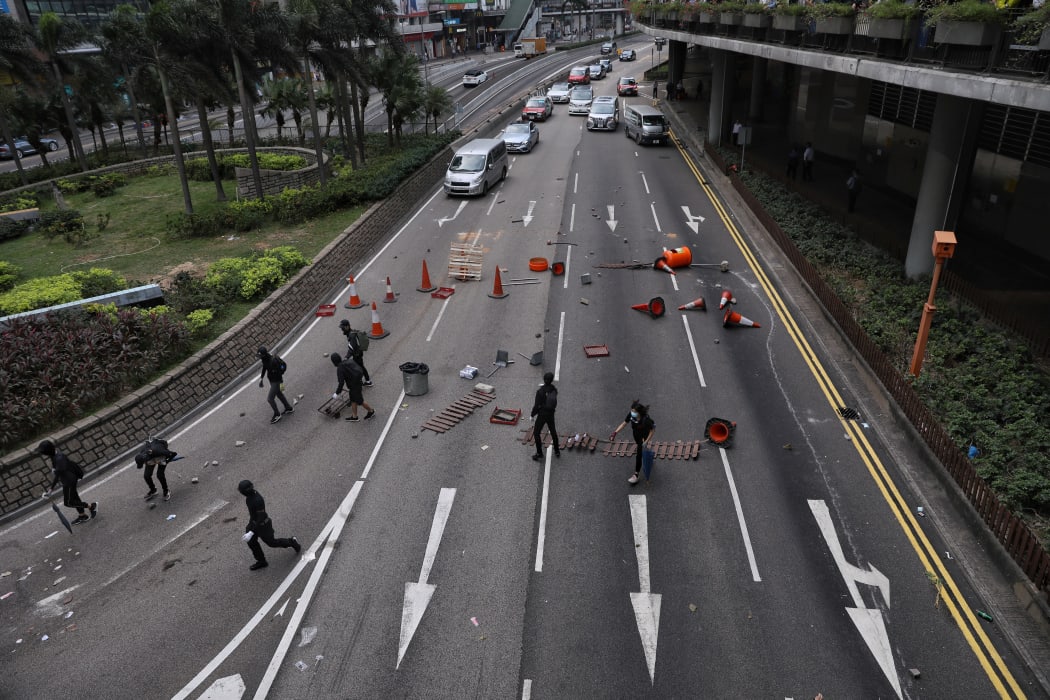 Pro-democracy barricade a road in the Central district in Hong Kong on 12 November 2019.
