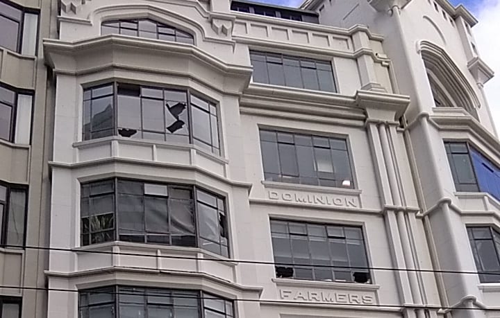 Broken windows in the Farmers Institute building on Featherston St, Wellington, after the 7.5 magnitude earthquake centred near Hanmer Springs.
