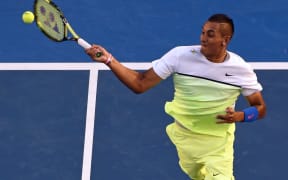 Nick Kyrgios plays a shot against Andy Murray at the 2015 Australian Open.