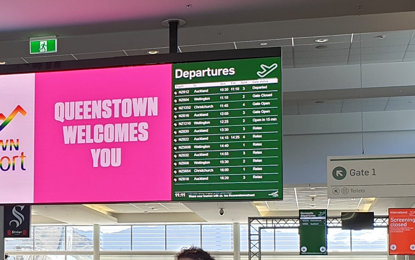 Travellers arrive at Queenstown Airport.